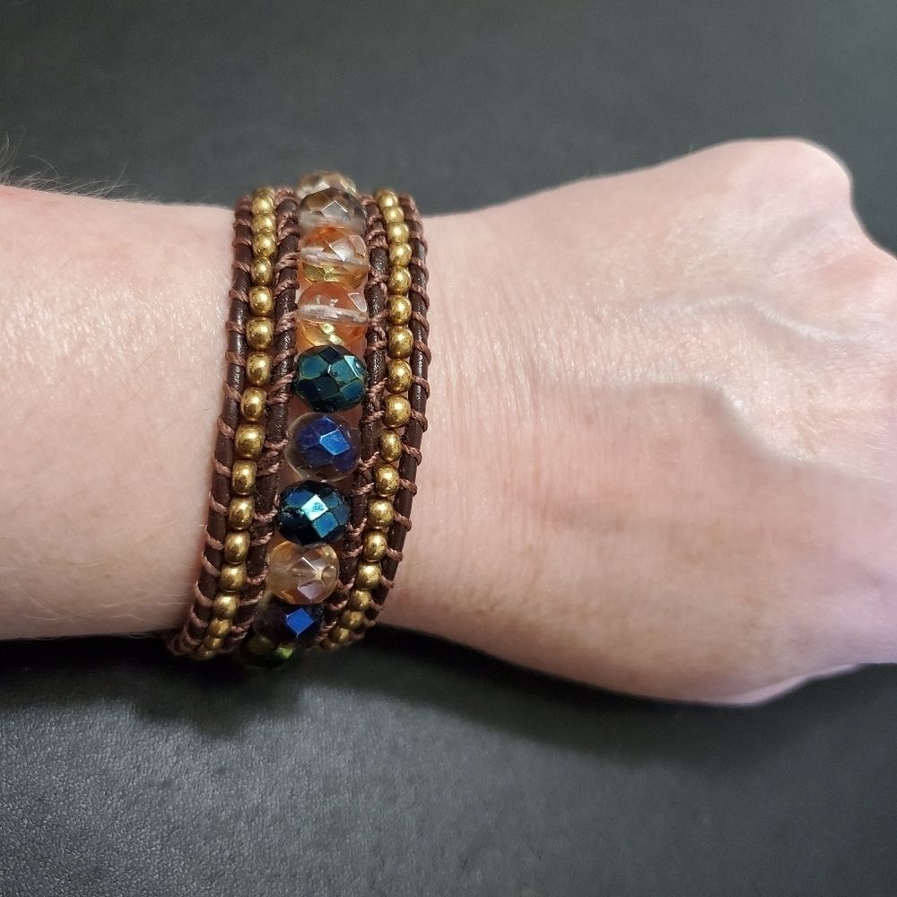 Brown bracelet with gold blue and green beads 7.5"